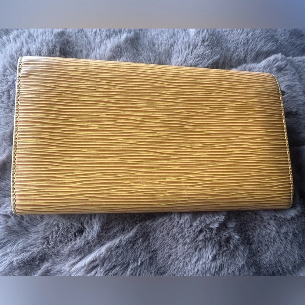 Louis Vuitton Yellow Epi Long Wallet with Purple Interior.
